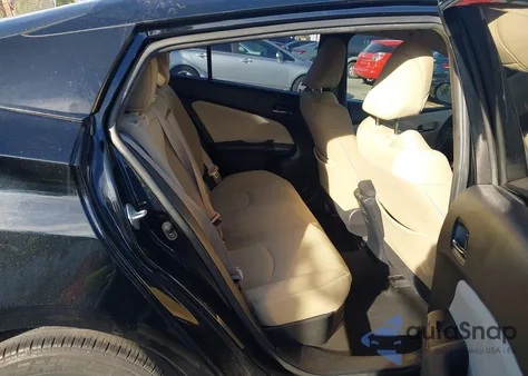 2021 Toyota Prius Le from USA, damaged, VIN JTDKAMFU3M3132231